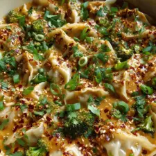 Oven-Baked Dumplings with Peanut Sauce